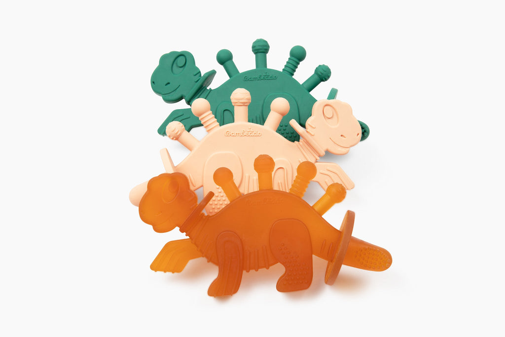 Dibly - Pink - Baltic Amber & Natural Rubber Dinosaur Teether with Toothbrush Tail